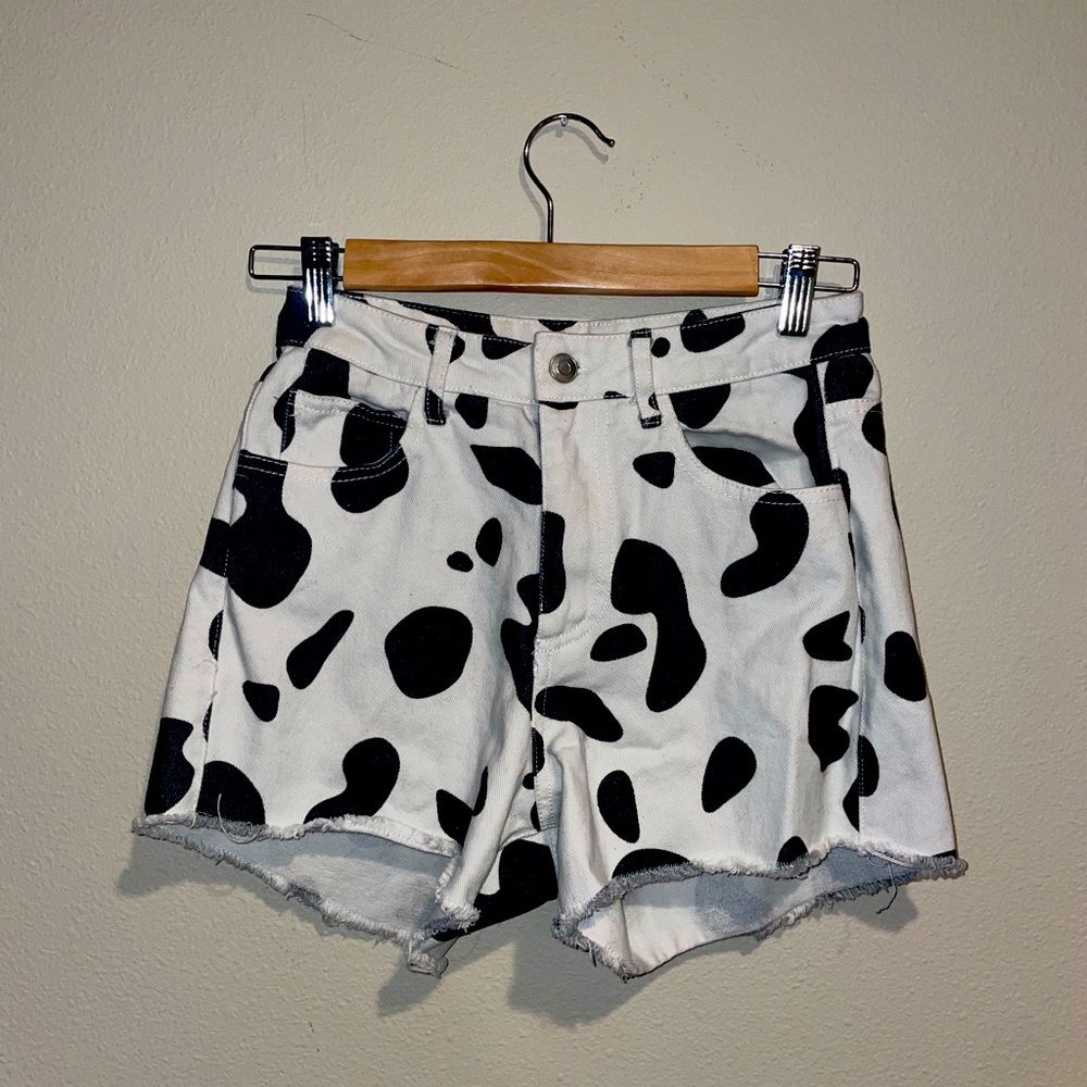 Cow print jean shorts
